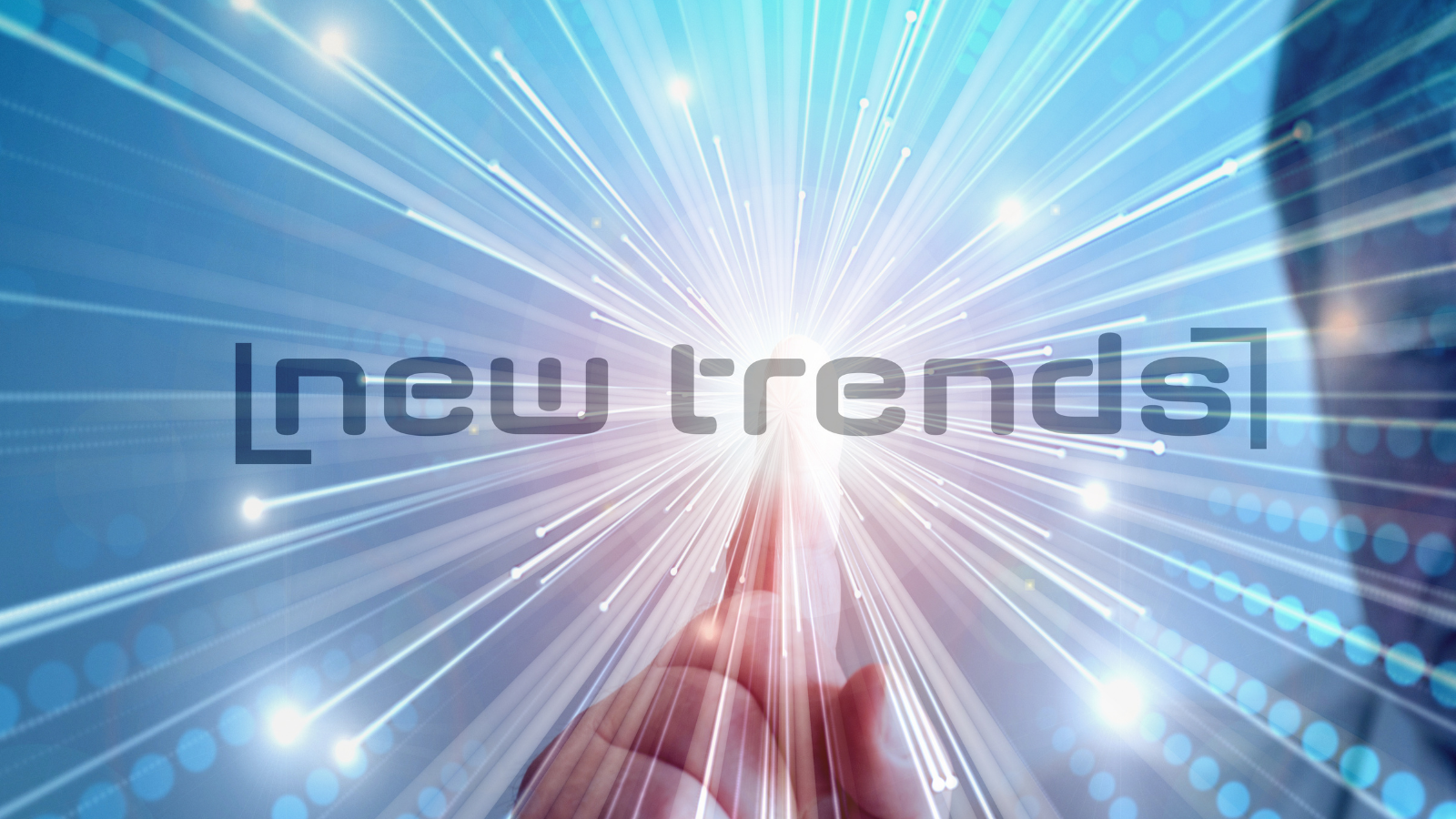 Finger touching digital lights. Words say 'New Trends'.