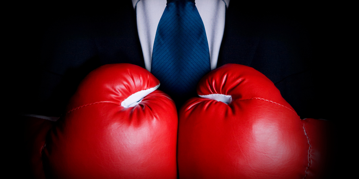 Suit with boxing gloves.