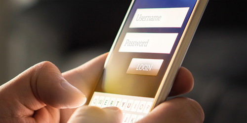 Mobile phone with messages on the screen.