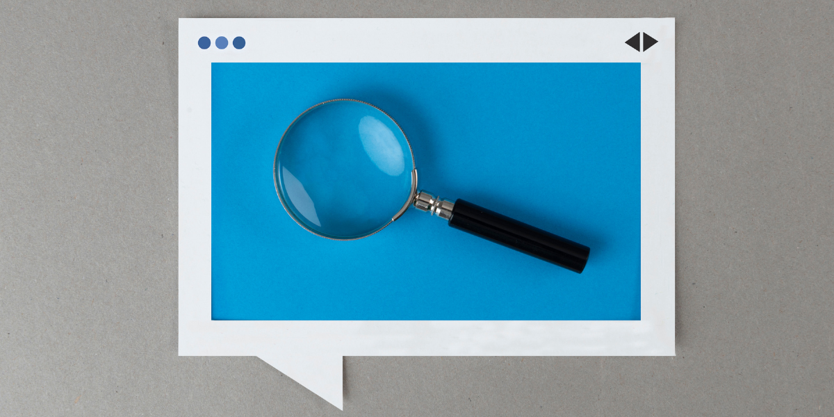 Magnifying glass on a blue background.