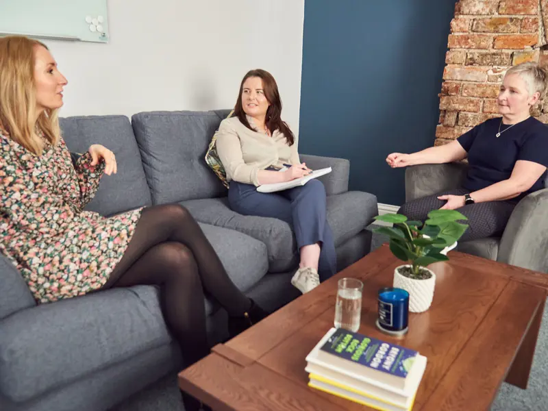 Conversion Marketing: Cal Partners team sit on a sofa in conversation. Pictured left to right: Rachel Wright, Marianne Carey and Alison O'Neill.